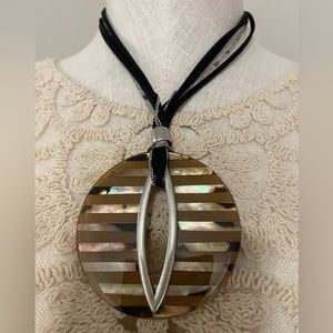 Bold round necklace with black multi layer strands